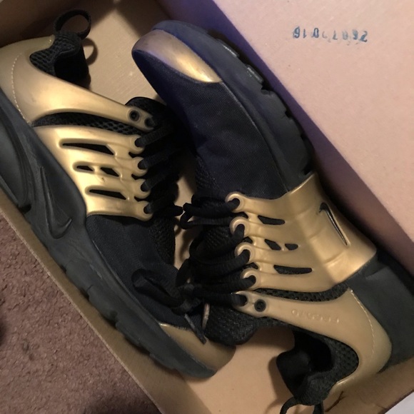Nike Shoes - Black and gold Nike prestos